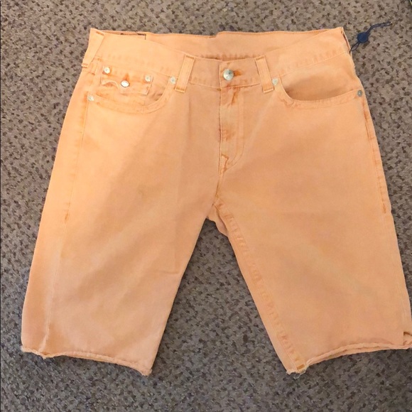 orange true religion shorts